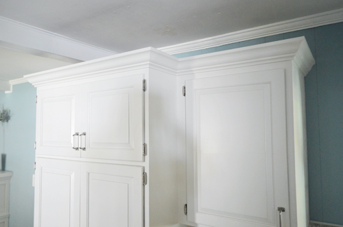 how to add crown molding to the top of your cabinets | young house