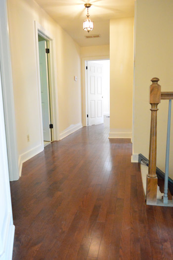 Laying Hardwood Flooring In A Hallway