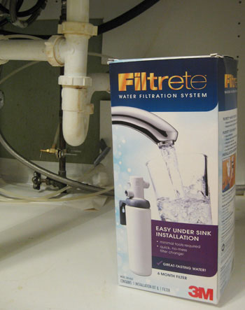 Installing A Filtrete Water Treatment System Under Our