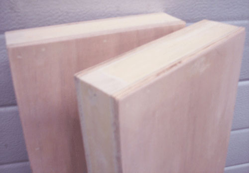 detail close-up of wood filler applied to DIY floating shelf building project