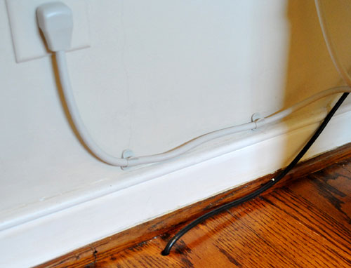 https://images.younghouselove.com/2010/07/Wires-Against-Wall.jpg