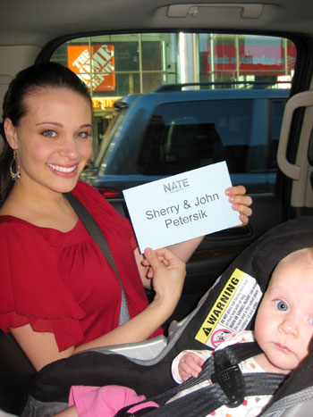 Berkus In Car With Sign