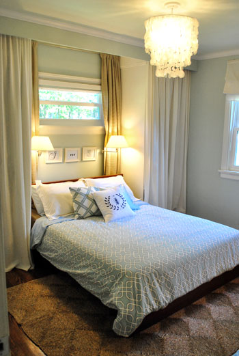 final bedroom with built in closets covered with curtains