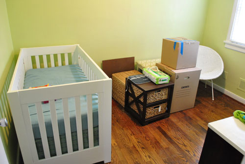 Nursery With Moving Boxes Filled And Furniture Ready To Go