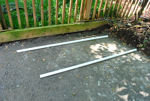 Dirt Two PVC Pipes Down