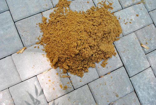 https://images.younghouselove.com/2011/05/Patio-Sand-Pile.jpg