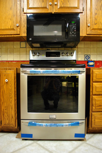 Oven/Microwave tower, concealed rangehood + drawers