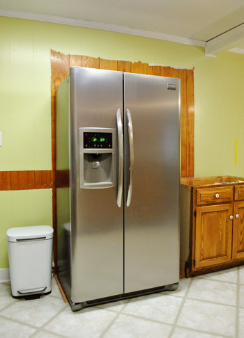 Putting a fridge freezer store in a cupboard