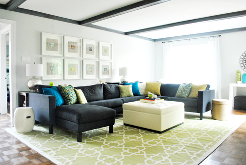her bold geometrics compliment the room's decor without dominating
