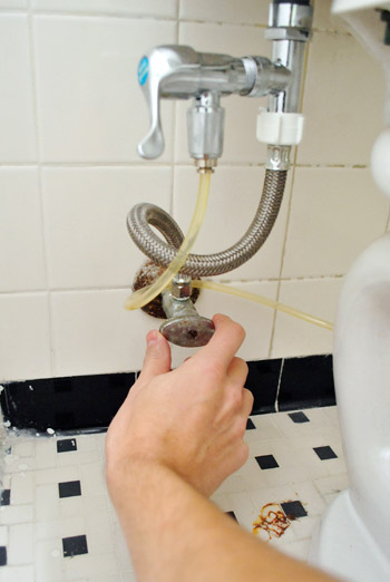 Turning off water valve to toilet with cloth diaper sprayer attachment