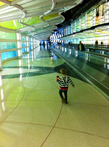 flying with toddler playing in the airport with cool lights