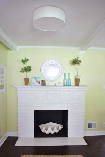 A Clean Flush Mounted Light Near The Fireplace Young House