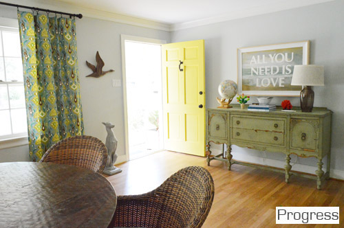 After Of Entryway With Yellow Painted Door And Vintage Green Console Table