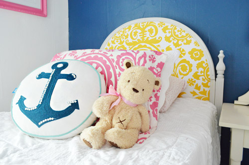 Blue Pink And Yellow Bright Pillows In Kids Room