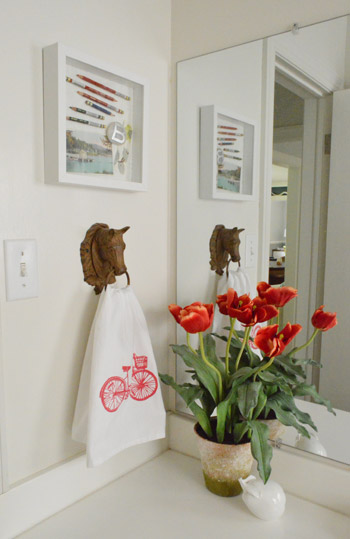 decorative objects on bathroom counter