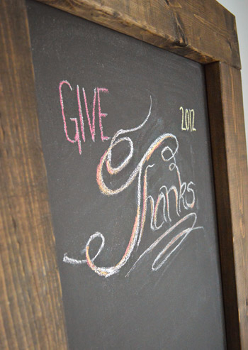 Give Thanks chalk lettering on DIY magnetic chalkboard with wood framed