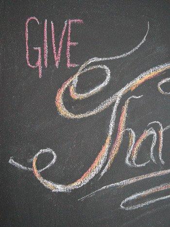 Close up of Give Thanks chalk lettering on DIY magnetic chalkboard