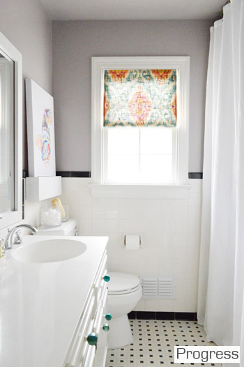 After of Hall Bathroom With Black And White Tile And Gray Walls and Colorful Window Treatment
