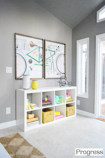 After Sunroom With Gray Walls and Cube Organizer With Bike Art