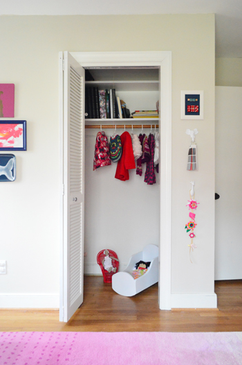 A Kids Closet With Some Play Space In It