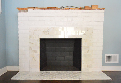 Fireplace Makeover Tiling The Mantel With Marble Herringbone