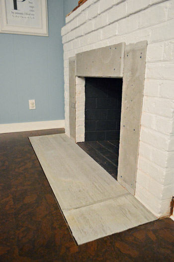 Fireplace Makeover Tiling The Mantel With Marble Herringbone