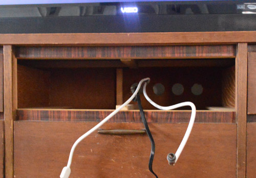 Clear the clutter: how to hide TV wires and cords [guest post from Young  House Love]