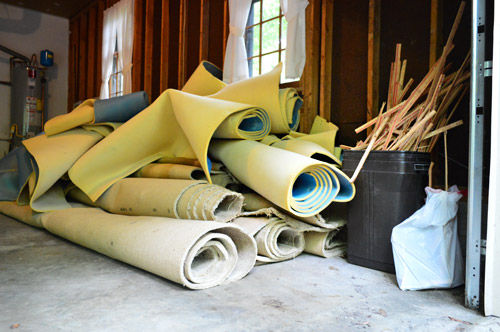 stacks for old carpet rolls ready for removal