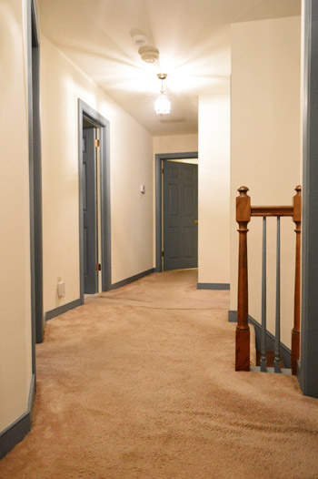 wrinkled old carpet in hallway