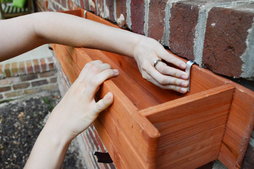 How to Hang a Window Box on Brick  