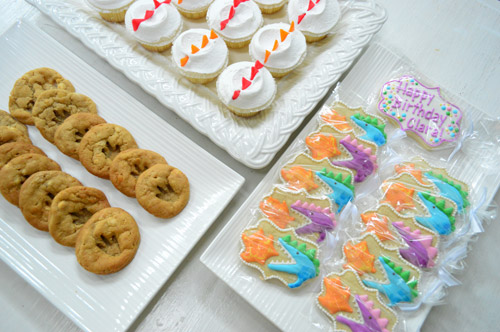 Desserts At Dragon Birthday Party With Footprint Cookies Iced Cookies Cupcakes With Scales