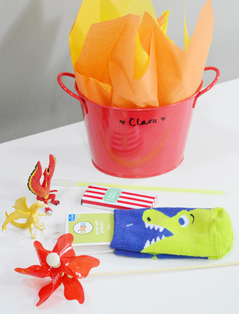 Contents Of Dragon Birthday Party Favors With Pinwheels | Dragon Socks | Dragon Figurines | Crayons