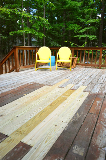 Another view of patched hole in wooden deck