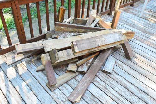 Pile of broken deck boards from hole repair