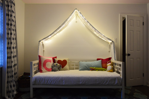 fairy lights above bed