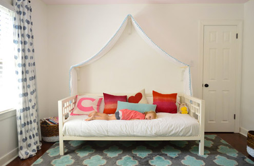 Before Photo Of Daybed With Fabric Canopy In Front Of Blank Wall