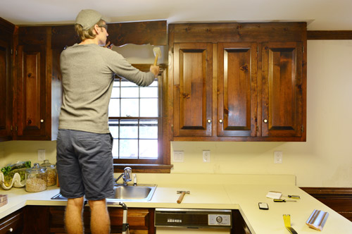 removing some kitchen cabinets & rehanging one | young house