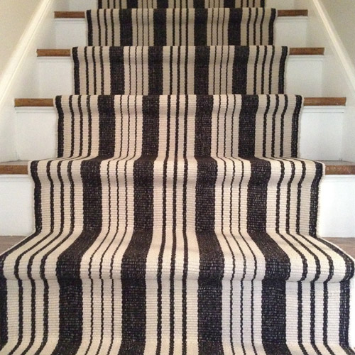 detail picture of finished stair runner installation to show hidden seam