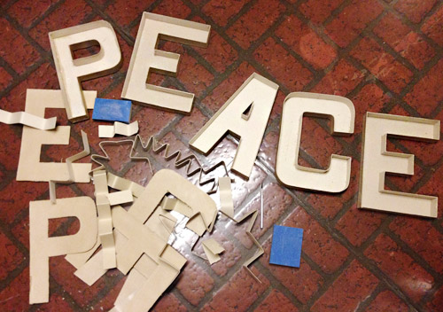 Cardboard craft letters with surface cut off