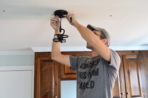 John connecting pendant light fixture to ceiling where fluorescent light fixture used to be