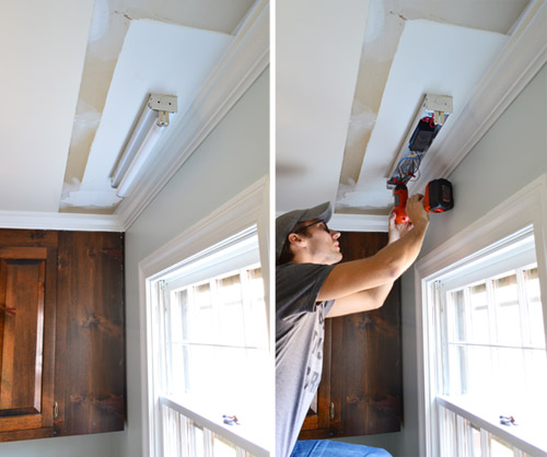 Fluorescent light fixture above kitchen sink getting uninstalled