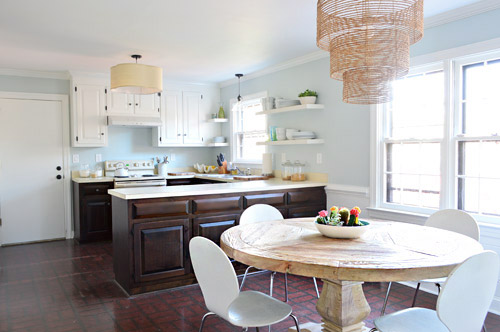 Final kitchen with dark stained lower cabinets and white painted upper cabinets