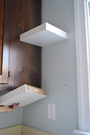 showing how short Ikea LACK floating shelves are attached to kitchen wall