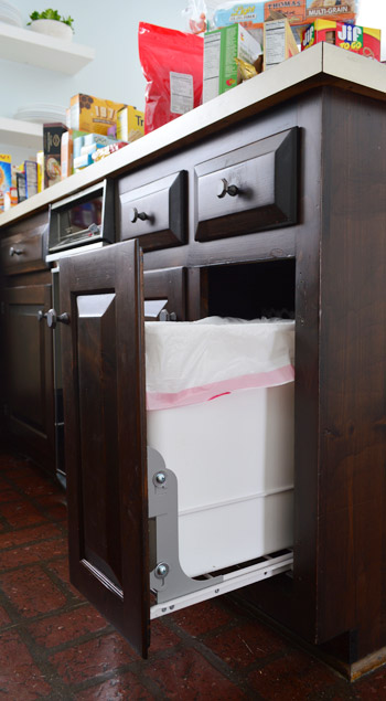 How to install a pull-out bin in a kitchen cupboard