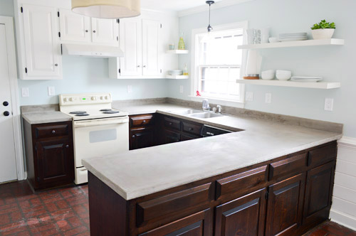 Faux concrete finish on laminate kitchen cabinets