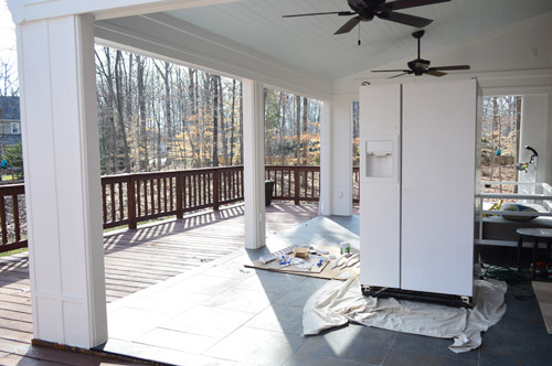 refrigerator drying on back porch after painting