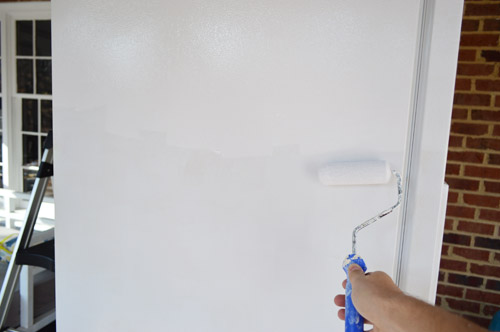 second coat of appliance epoxy on refrigerator