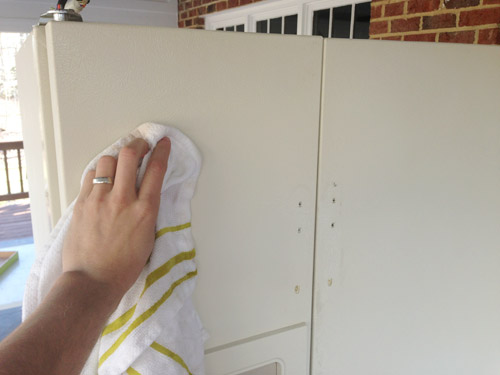 cleaning refrigerator door of sanding dust before painting