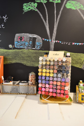 Tabletop Paint Display On Desk Made Out Of Old Door