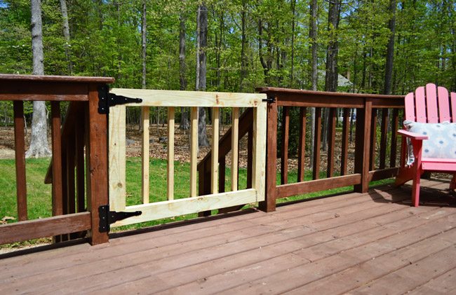 Finished DIY Deck Gate Added To Fence With Raw Wood Pressure Treated Pine